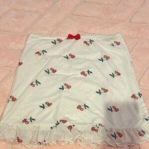 Sugar Thrillz White Skirt with Cherry Print and Red Bow